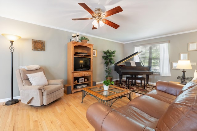 7104 Elrod Rd, Fairview, TN 37062 - living area with light wood-style floors, ceiling fan, crown molding, and baseboards