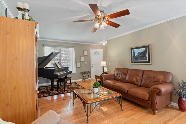 7104 Elrod Rd, Fairview, TN 37062 - living room with ornamental molding, light wood-style flooring, a ceiling fan, and baseboards