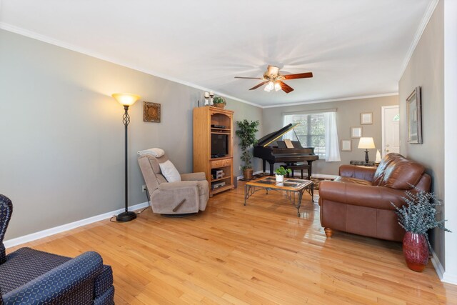 7104 Elrod Rd, Fairview, TN 37062 - living area featuring light wood-style floors, a ceiling fan, ornamental molding, and baseboards