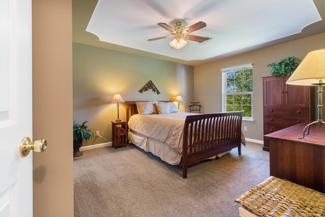 7104 Elrod Rd, Fairview, TN 37062 - carpeted bedroom with baseboards and a ceiling fan