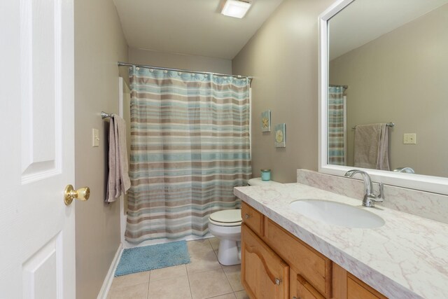 7104 Elrod Rd, Fairview, TN 37062 - bathroom featuring vanity, toilet, tile patterned flooring, curtained shower, and baseboards
