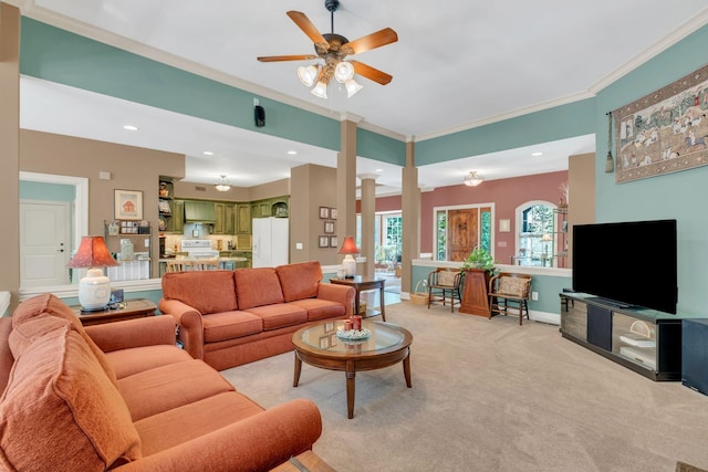 1764 Warren Hollow Rd, Nolensville, TN 37135 - living room featuring crown molding, light colored carpet, ceiling fan, decorative columns, and baseboards