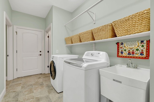 1764 Warren Hollow Rd, Nolensville, TN 37135 - laundry room featuring separate washer and dryer and stone finish floors