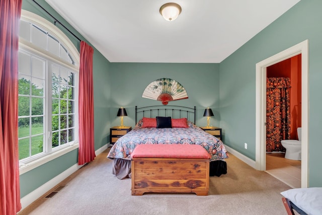 1764 Warren Hollow Rd, Nolensville, TN 37135 - carpeted bedroom with multiple windows, baseboards, and ensuite bathroom