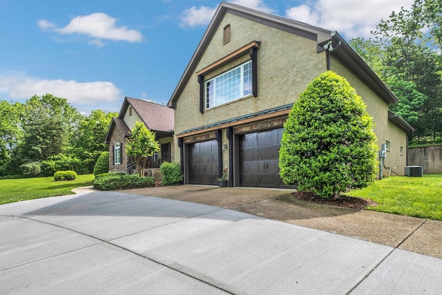1764 Warren Hollow Rd, Nolensville, TN 37135 - view of property exterior with driveway, an attached garage, a lawn, and central AC unit