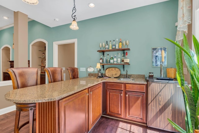 1764 Warren Hollow Rd, Nolensville, TN 37135 - indoor wet bar with dark wood-type flooring, hanging light fixtures, recessed lighting, and baseboards