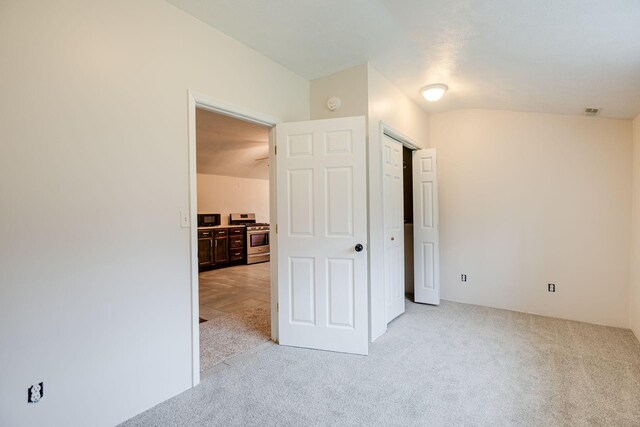 8310 Dog Creek Rd, Primm Springs, TN 38476 - unfurnished bedroom with light carpet and a closet