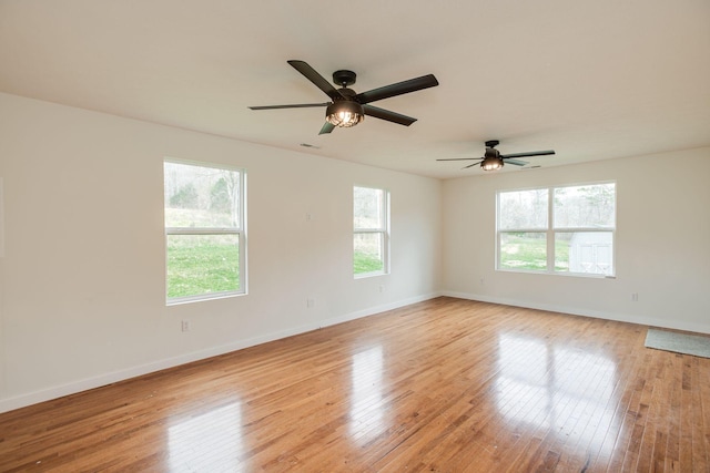 8310 Dog Creek Rd, Primm Springs, TN 38476 - spare room with light wood-type flooring, baseboards, and a ceiling fan
