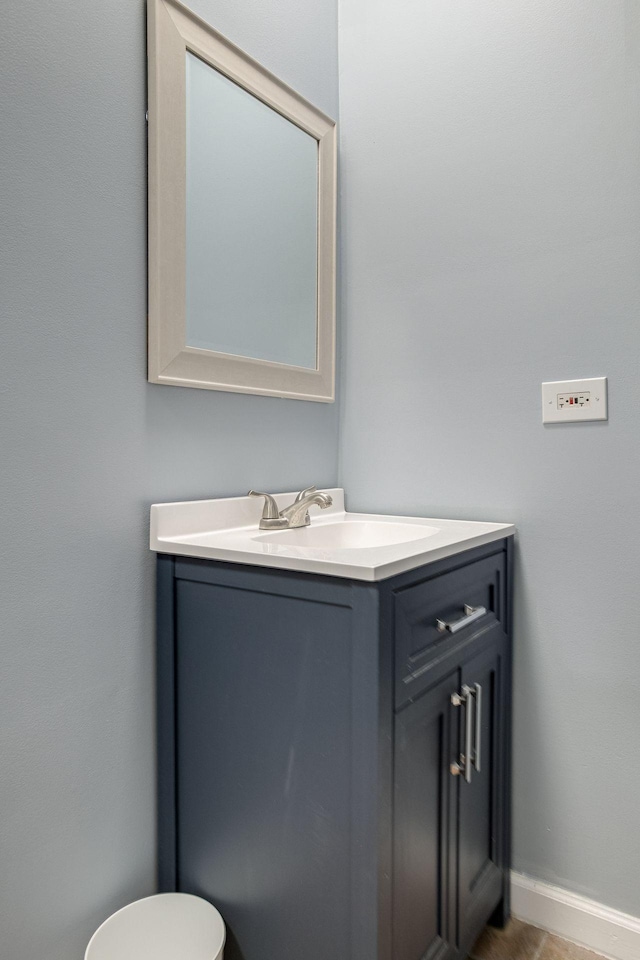 8310 Dog Creek Rd, Primm Springs, TN 38476 - bathroom with vanity, baseboards, and toilet