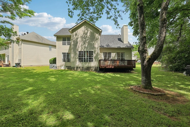 1423 Clairmonte Cir, Franklin, TN 37064 - back of property with a wooden deck, a lawn, and a chimney
