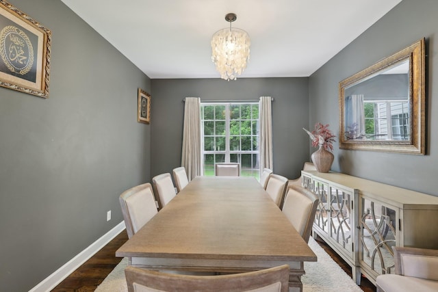 1423 Clairmonte Cir, Franklin, TN 37064 - dining area with dark wood-style floors, a chandelier, and baseboards