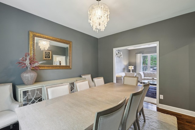 1423 Clairmonte Cir, Franklin, TN 37064 - dining space featuring a chandelier, wood finished floors, and baseboards