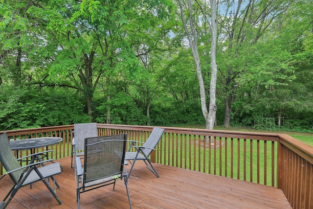 1423 Clairmonte Cir, Franklin, TN 37064 - wooden deck featuring outdoor dining space and a lawn