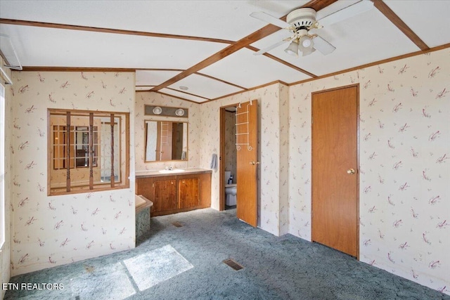 full bath featuring wallpapered walls, vaulted ceiling, toilet, a ceiling fan, and vanity