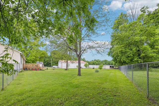 view of yard featuring a deck