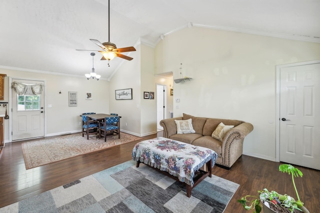 living area featuring wood finished floors, crown molding, ceiling fan, baseboards, and high vaulted ceiling