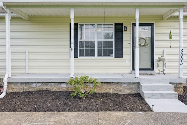 entrance to property with covered porch