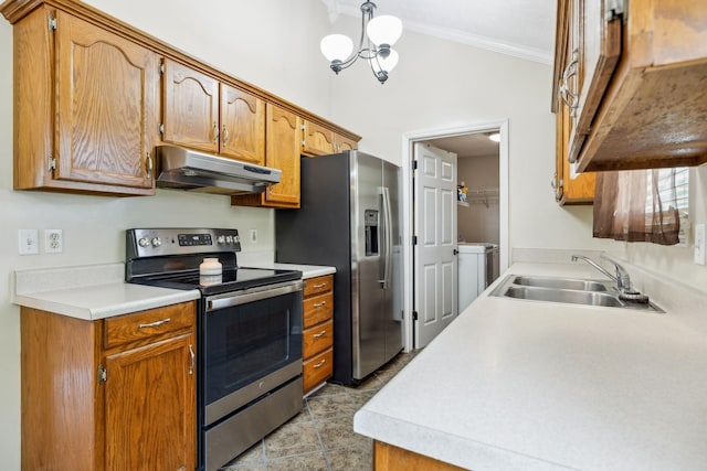 kitchen with under cabinet range hood, stainless steel appliances, a sink, ornamental molding, and light countertops