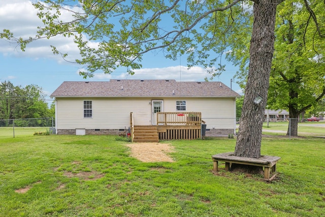 back of property with crawl space and a wooden deck