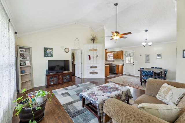 living area featuring a ceiling fan, lofted ceiling, crown molding, dark wood-style floors, and baseboards