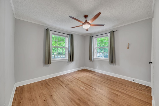 215 Wheeler Ave, Nashville, TN 37211 - spare room featuring a ceiling fan, a textured ceiling, light wood-style floors, baseboards, and crown molding