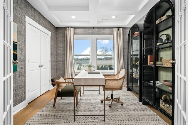 office featuring wallpapered walls, coffered ceiling, beamed ceiling, wood finished floors, and recessed lighting