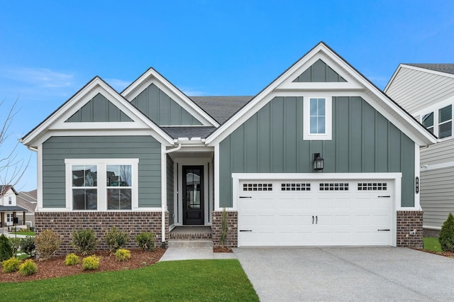 view of front of property featuring board and batten siding, brick siding, and concrete driveway