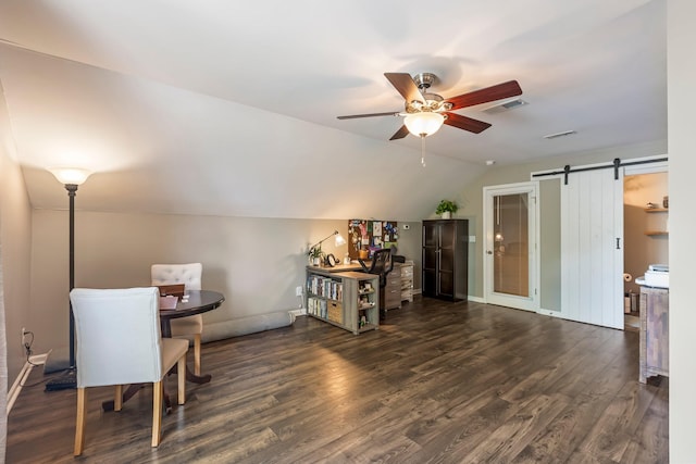 living area featuring lofted ceiling, a ceiling fan, wood finished floors, and a barn door