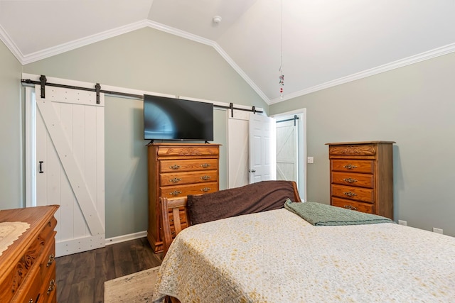 bedroom with a barn door, dark wood-style floors, lofted ceiling, and ornamental molding