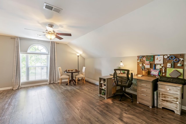 home office featuring lofted ceiling, dark wood-style flooring, a ceiling fan, and baseboards