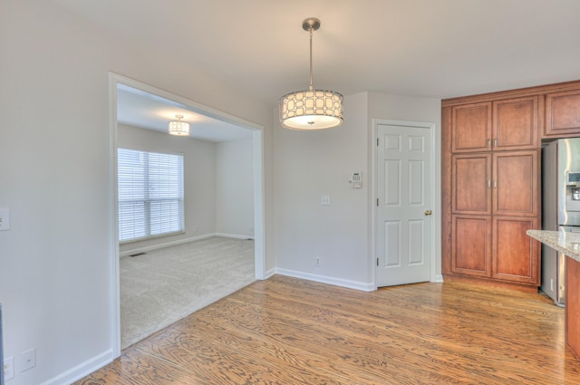 408 Parish Pl, Franklin, TN 37067 - unfurnished dining area featuring light wood finished floors and baseboards