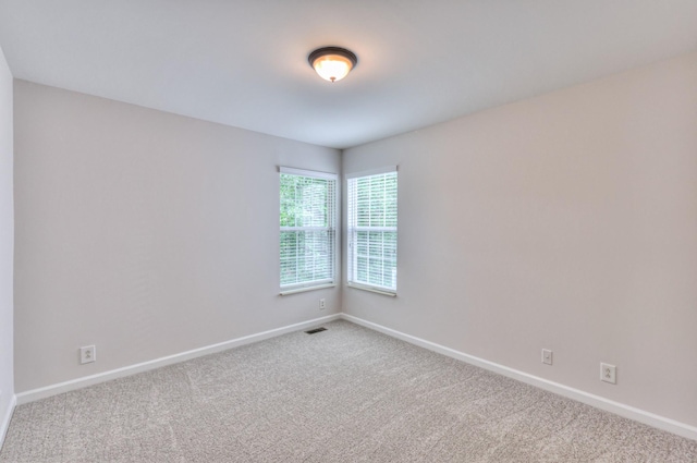 408 Parish Pl, Franklin, TN 37067 - carpeted empty room with baseboards