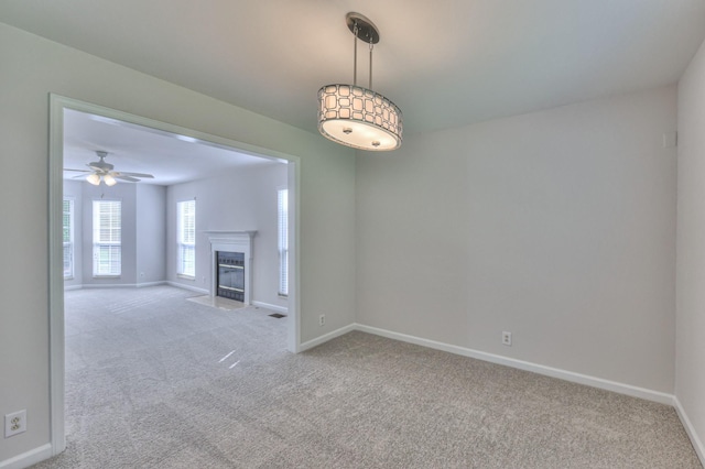 408 Parish Pl, Franklin, TN 37067 - unfurnished living room with carpet floors, baseboards, and a ceiling fan