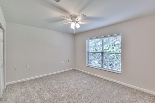 408 Parish Pl, Franklin, TN 37067 - spare room featuring carpet floors, a ceiling fan, and baseboards