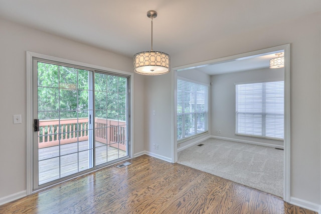 408 Parish Pl, Franklin, TN 37067 - unfurnished dining area featuring wood finished floors and baseboards
