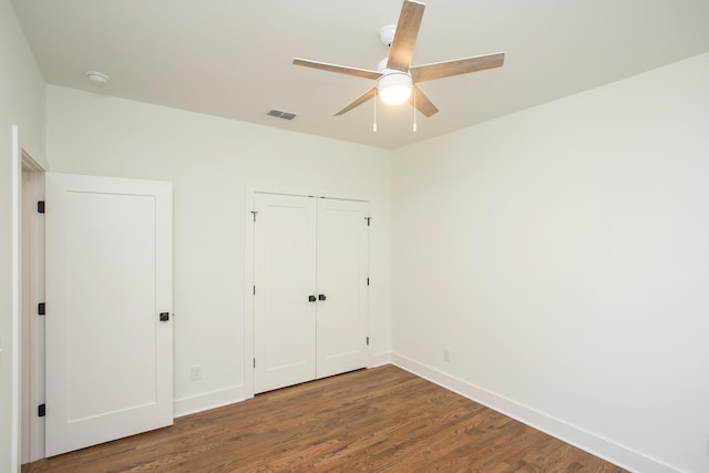 431B Basswood Ave, Nashville, TN 37209 - unfurnished bedroom featuring wood finished floors, baseboards, a closet, and a ceiling fan