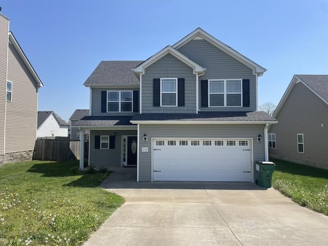 view of front facade featuring concrete driveway and a garage