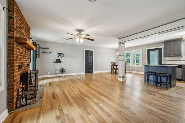4408 Alpine Way, Murfreesboro, TN 37129 - unfurnished living room with baseboards, light wood-type flooring, and a ceiling fan