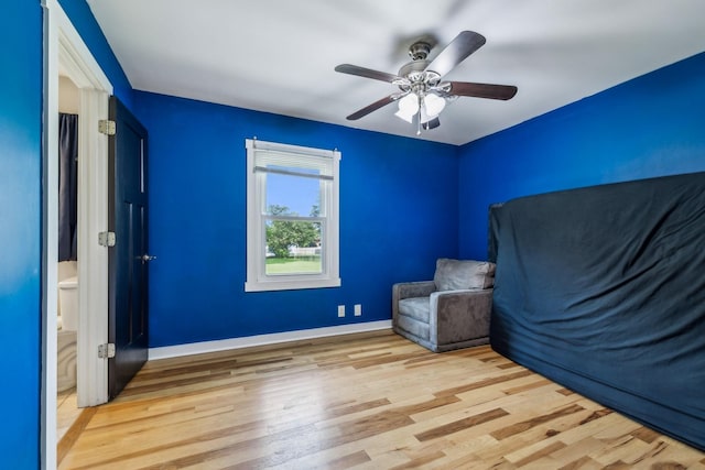 4408 Alpine Way, Murfreesboro, TN 37129 - unfurnished bedroom with wood finished floors, baseboards, and a ceiling fan