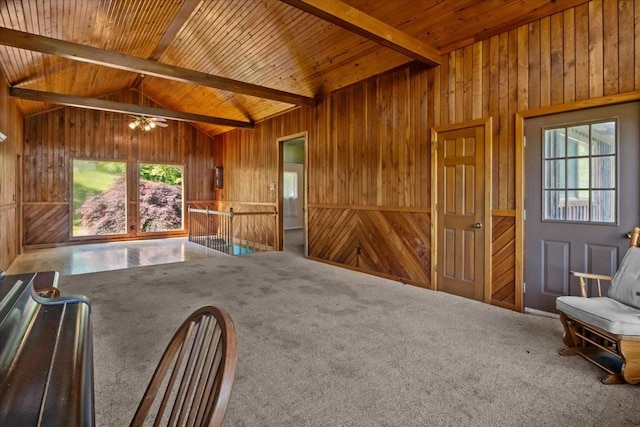 4410 Trace Creek Rd, Mc Ewen, TN 37101 - living area with wooden walls, wooden ceiling, carpet flooring, and a ceiling fan