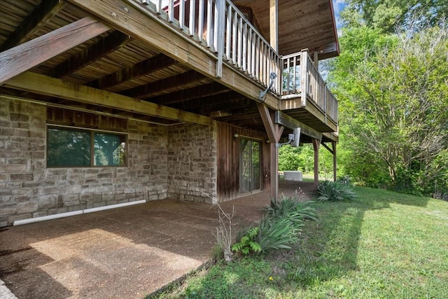 4410 Trace Creek Rd, Mc Ewen, TN 37101 - view of side of property featuring a yard, a balcony, stone siding, and a patio