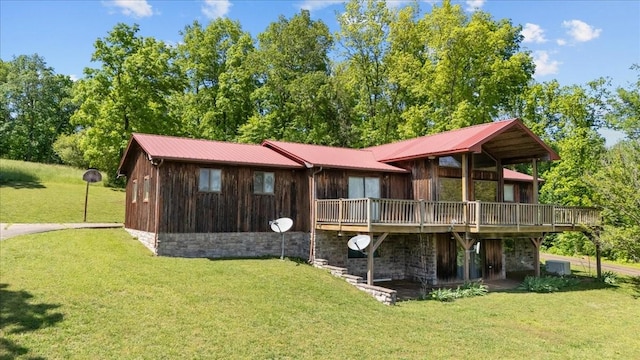 4410 Trace Creek Rd, Mc Ewen, TN 37101 - back of property featuring a wooden deck, metal roof, and a yard