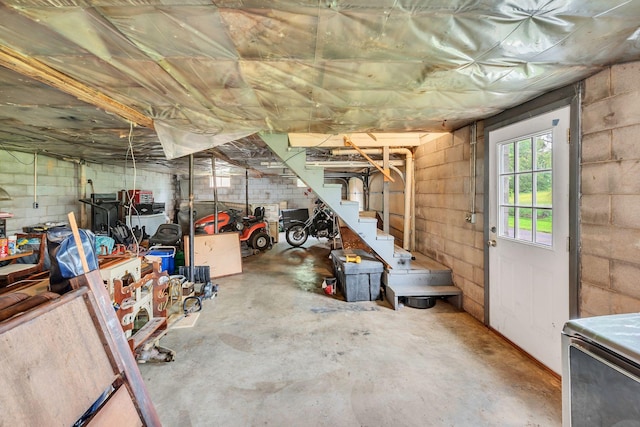 1006 Hillcrest Cir, Pleasant View, TN 37146 - basement with concrete block wall and stairs