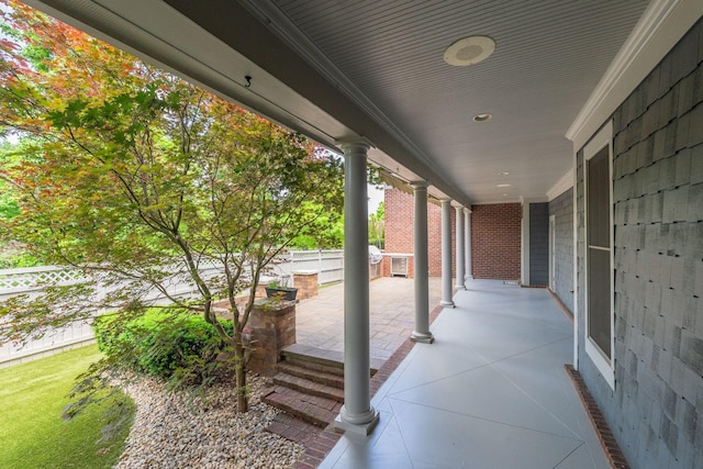 view of patio / terrace featuring fence