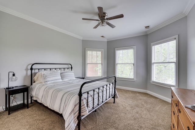 bedroom with light carpet, baseboards, crown molding, and a ceiling fan