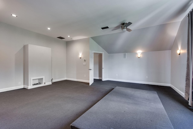 bonus room featuring ceiling fan, dark colored carpet, vaulted ceiling, baseboards, and recessed lighting