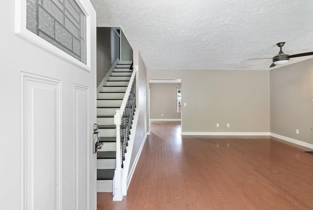 325 Golfview Ln, Springfield, TN 37172 - stairway with a ceiling fan, a textured ceiling, wood finished floors, and baseboards