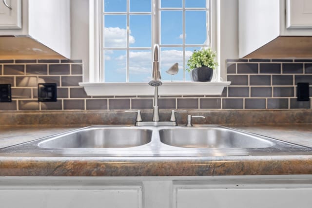 325 Golfview Ln, Springfield, TN 37172 - kitchen view of a sink, white cabinetry, and dark countertops