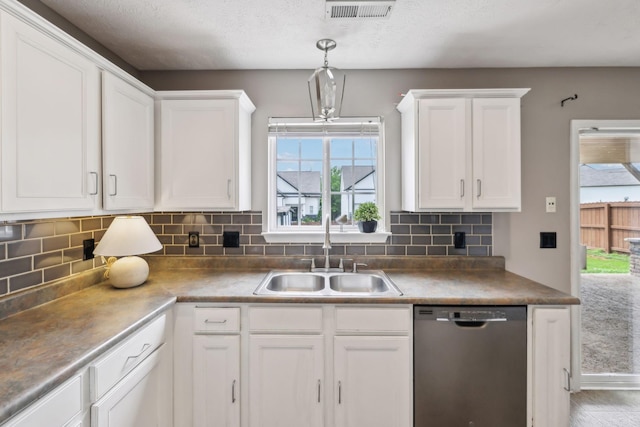 325 Golfview Ln, Springfield, TN 37172 - kitchen featuring dishwasher, a sink, white cabinets, backsplash, and plenty of natural light