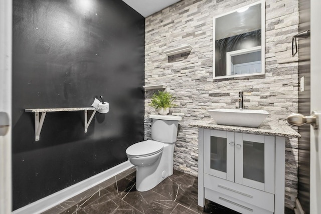 325 Golfview Ln, Springfield, TN 37172 - bathroom with toilet, marble finish flooring, vanity, and baseboards